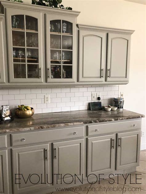 Backsplash light grey shaker style kitchen cabinet painted in benjamin moore 1475 graystone. Mindful Gray Kitchen Cabinets - Evolution of Style