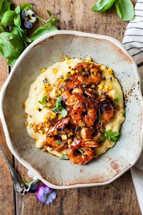 Plate the polenta with the shrimp, spinach and tomatoes on top, serve immediately. Honey Garlic Shrimp With Golden Corn Polenta • Salted Mint