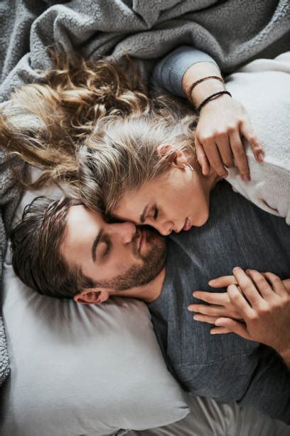 Romantic Young Couple Sleeping In Bed Stock Photos Pictures And Royalty