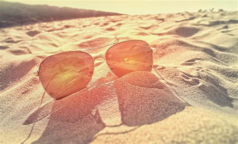 Free Stock Photo Of Sunglasses On The Sand At Sunset Summer And Beach