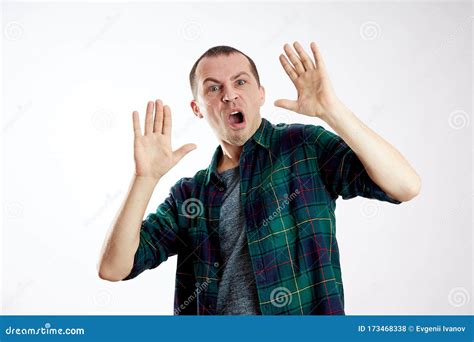Fear And Fright Of A Man Guy Is Afraid Scared Face Stock Photo