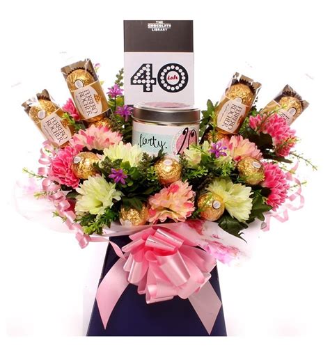 Whether it's a family member, colleague, or best friend celebrating their special day, you'll find the perfect birthday bouquet to put a smile on their face. 40th birthday Candle and Ferrero Rocher Bouquet.