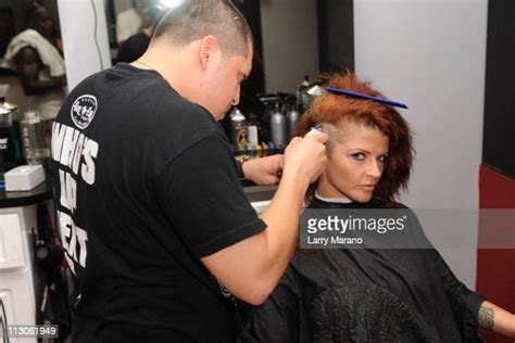 Joslyn James Gets A New Hair Style At The Hall Of Fame Barber Shop On