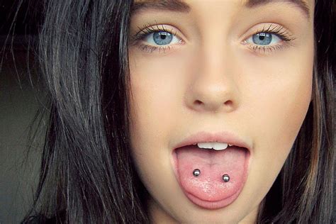 tongue piercing vean tattoo