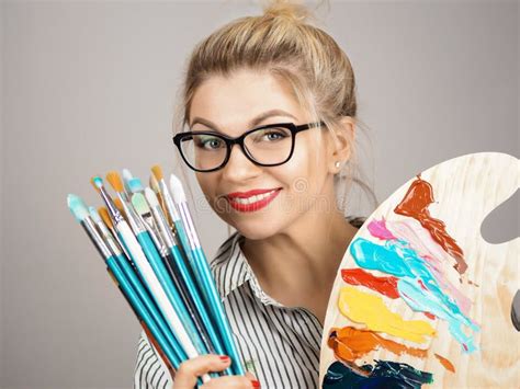 Beautiful Woman Artist With Art Tools Painted Palette And Brushes Stock Photo Image Of Hobby