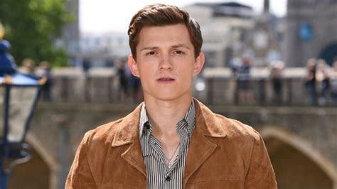 His hair colour is dark brown, and also his eyes colour body measurements: Tom Holland | Full Bio, Movies, Height, Age, Girlfriend ...