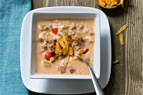 Uncover crockpot and stir in shredded cheese and milk/flour mixture. Crockpot Bacon Cheeseburger Soup from Scratch | Housewife ...