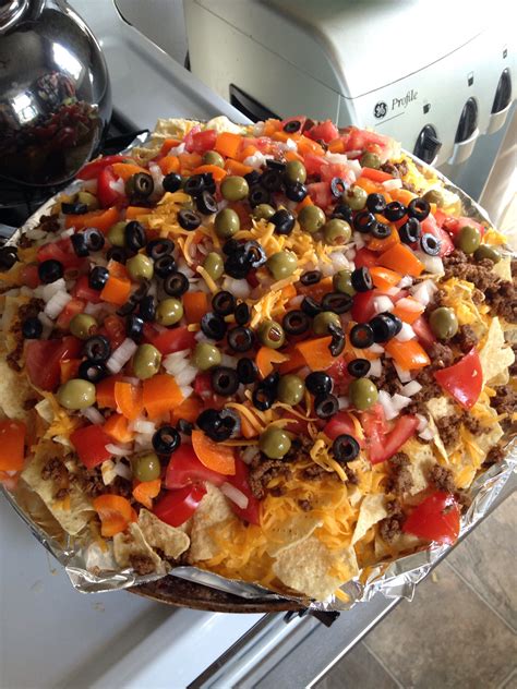 Take it out and remove the seal and serve hot. Home made nachos! Yum! Oven @ 350 for 20-30 minutes until ...