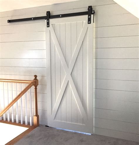 Shiplap Walls And X Style Sliding Barn Door To Divide A Third Floor