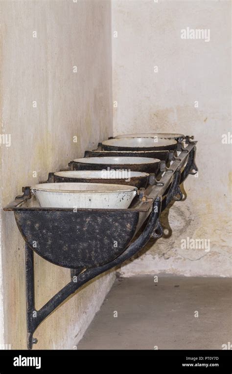 Row Of Old Dirty Sinks In An Old Factory Stock Photo Alamy