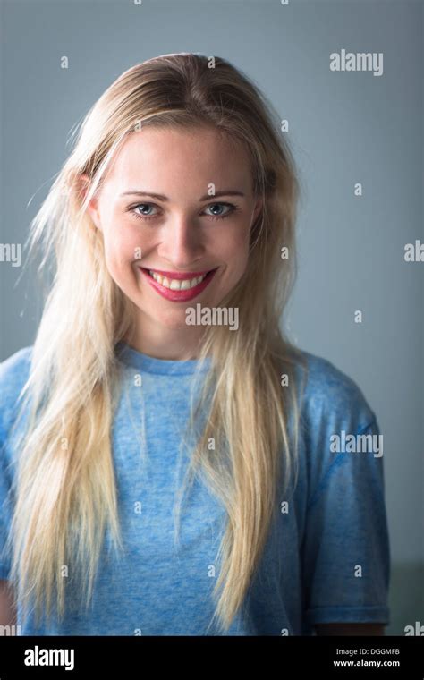 Young Woman Long Blonde Hair Smiling Hi Res Stock Photography And