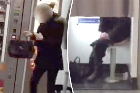 WATCH Babe Woman Caught Taking Poo In Train Station Photo Booth