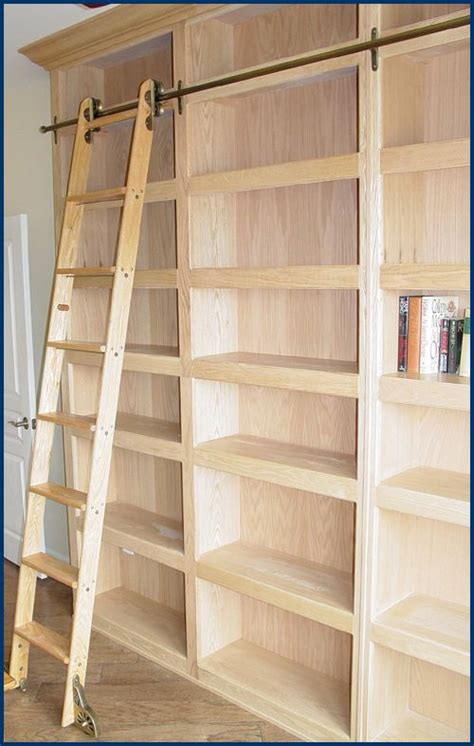 I installed a 2×4 that ran floor to ceiling against each side wall so i had something to attach the. Hanson House Custom Furniture Bookcases | Home library ...