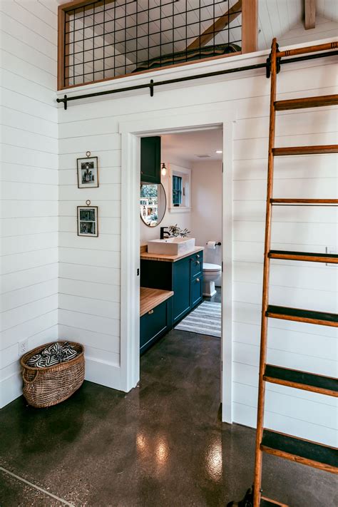 Given how heavy the cabinet is, i guess it'd probably need some fairly long screws and plugs. Design: Jill Ellis Creates Photographer: Jennifer Yau Location: Santa Barbara, CA Guest bathroom ...