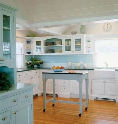 From traditional, french, country, old world, coastal, or farmhouse style kitchens, a blue and white color theme looks beautiful. coastal kitchens | Coastal Kitchen with Seafoam Green and Seaglass color cabinets. | kitchen ...