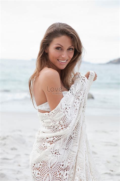 Woman Wrapped In A Blanket On The Beach Picture And Hd Photos Free Download On Lovepik