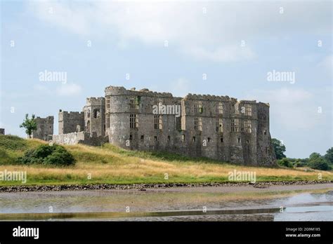 Carew Castle And Tidal Mill Pembrokeshire Wales Stock Photo Alamy