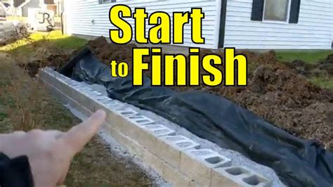 Building A Retaining Wall With Concrete Blocks Youtube