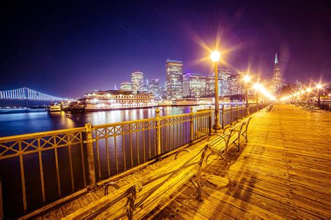 Old Pier And San Francisco Skyline With Bay Bridge At Night Free Stock