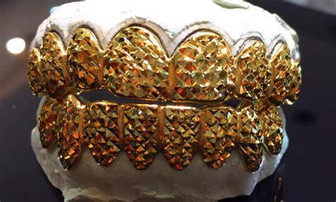 Custom grillz featuring all of the popular gold permanent cut grillz! 10K Solid Yellow White Rose Gold Custom fit Princess Diamond Cut Grill Gold Teeth GRILLZ.