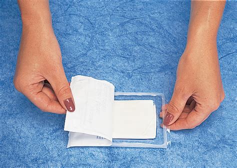 With the thumb and index nger of your dominant hand, grasp the folded top edge of the drape. Sensicare Sterile PF Vinyl Exam Gloves 484406 Medline