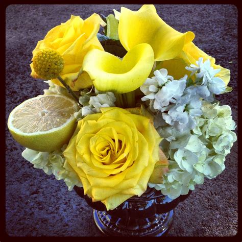 Check spelling or type a new query. Yellow flowers in a small black ceramic urn. | Ceramic urn ...