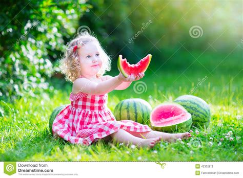 Little Girl Eating Watermelon Stock Photo Image Of Green