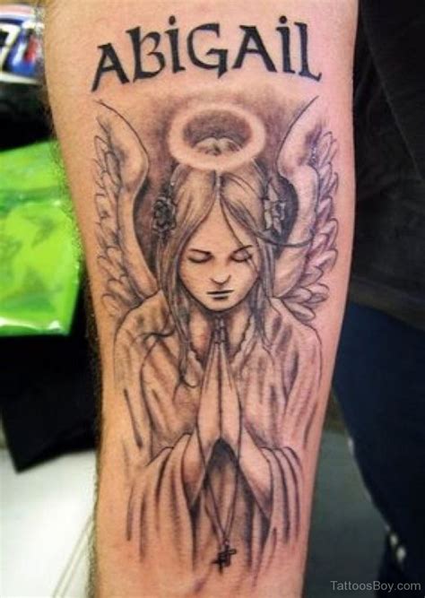 Awesome Memorial Angel Tattoo On Wrist Tattoos Designs