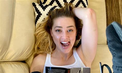 In Latest Update Amber Heard Appears Sassy With Her Timeout Reading