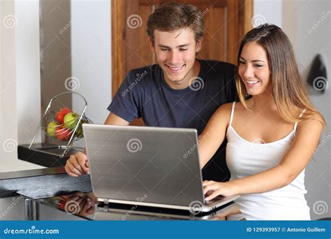 Couple Checking Laptop Content At Home Stock Image Image Of Happy Lifestyle 129393957