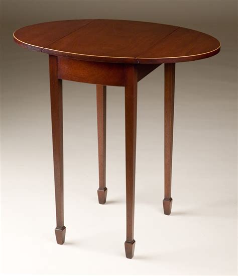 Mid 19th century antique english sheraton style game table with graceful legs in mahogany, circa 1860. Sheraton Style Drop Leaf Table