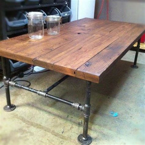 This easy industrial pipe bench is made out of 2x8 pine' and black iron pipe. Reclaimed barn wood table with pipe legs - for legs under ...