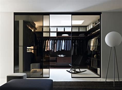A bedroom that was transformed into a glamorous walk in dream closet with custom built cabinets designed for the owner's needs. Doc Mobili's Modern Walk-In Closets - DigsDigs