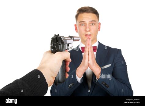 Businessman Holding Gun Head Fotografías E Imágenes De Alta Resolución