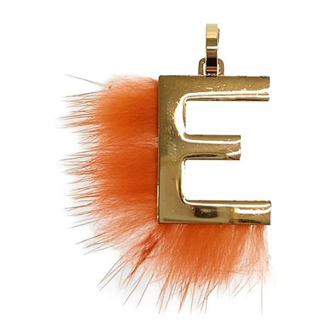 Shop fendi keyrings & chains for women at farfetch and find furry pom poms and mini monster keychains with a quirky charm. FENDI Alphabet charm Bag charm keychain Necklace Pendant ...
