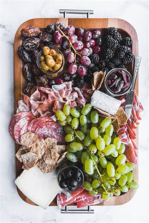 On a large prepared board, in the center, leave a space to add the bowl of the hot chili, right before serving. How To Make A Charcuterie Board (With images ...