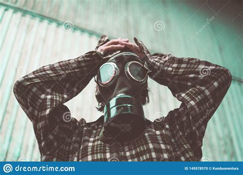Person Wearing A Gas Mask Contamination Concept Stock