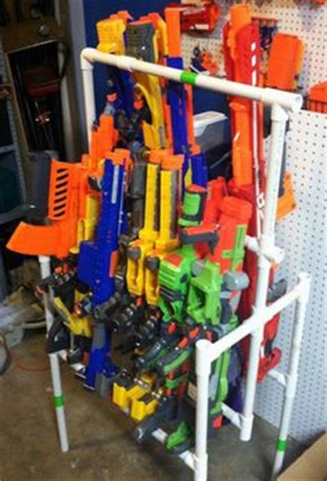 The gun holders are acoustic foam tiles, cut to fit and the shelves are lined with thick, tool box drawer liners (to prevent the guns from. We made this Nerf gun cabinet with 2 IKEA Besta shelf ...