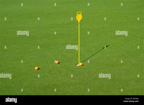 Golf Hole In The Green Field Stock Photo Alamy