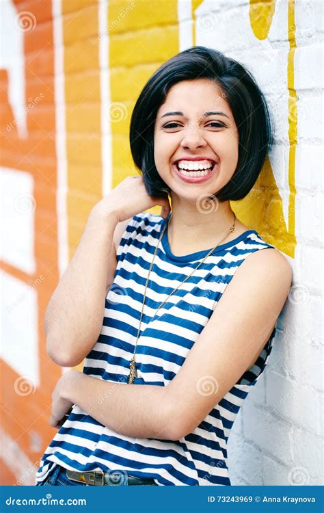 Portrait Of Beautiful Laughing Young Hipster Brunette Latin Hispanic