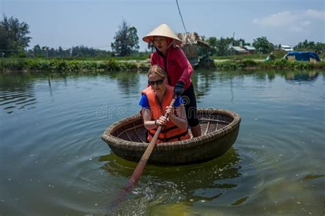 Hoi An Vietnam April 21 2018 Caucasian Woman Learns To Use Thung Chai Round Boat With Guide
