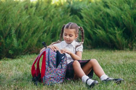 Cute Elementarh Schoolgirl Uniform Sitting Backpack Grass Stock Photos