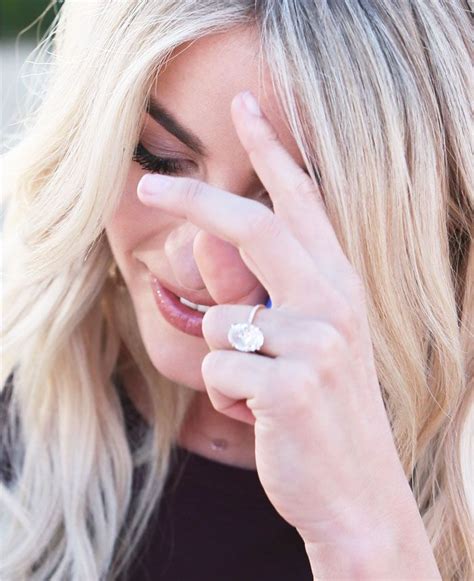 Julianne shows off her enormous engagement ring from fiancé Brooks