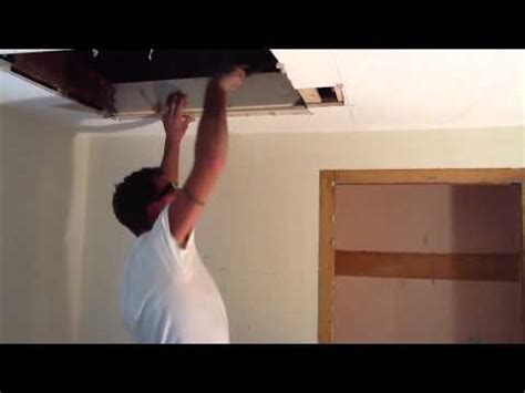 Replacing a ceiling box is a messy job. One Man cuts in a attic access and cuts in a ceiling fan ...