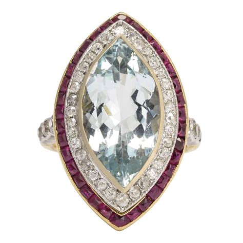 As we reviewed earlier, the navette shape in general was popular, so naturally the marquise shape would have had its heyday in the edwardian era. Antique Edwardian 7.82 Carat Aquamarine Diamond Ruby Marquise Halo Ring at 1stdibs