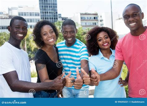 group of successful african american men and women showing thumb stock image image of america