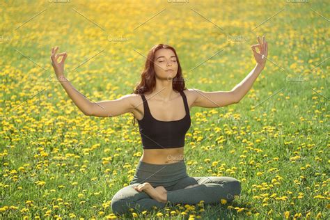 Young Girl Doing Yoga In The Park Containing Yoga Park And Meditation High Quality Sports