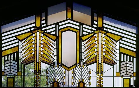 A Stained Glass Window With Geometric Designs On It