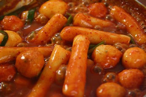 Boil the soup stock in a shallow pot over medium high heat and dissolve the tteokbokki sauce by stirring it with a spatula. Hot and spicy rice cake (Tteokbokki) recipe - Maangchi.com