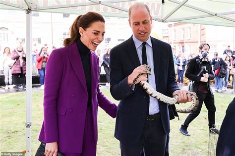 Purple Reign Kate Middleton Dons A Vibrant Magenta Pant Suit As She Joins Prince William